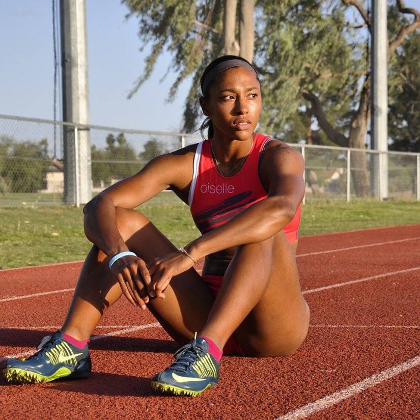 Shante trackside, representing her newest sponsor, Oiselle.
